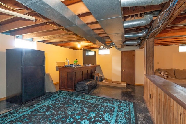 739 Pre Emption Rd, Geneva-City, NY 14456 - below grade area featuring a dry bar and freestanding refrigerator