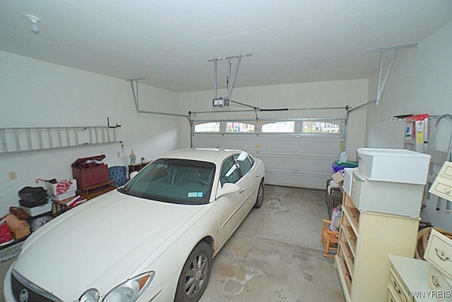 garage featuring a garage door opener