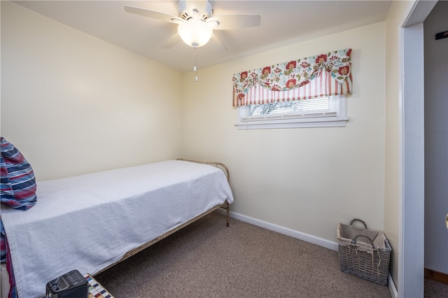 bedroom with carpet, a ceiling fan, and baseboards