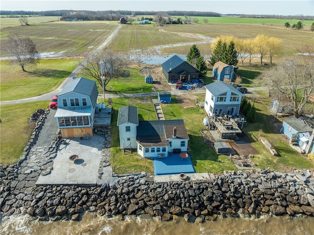 birds eye view of property featuring a rural view