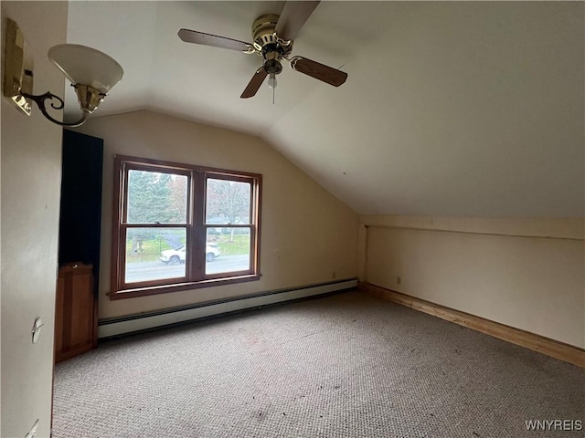 bonus room featuring a baseboard radiator, lofted ceiling, a ceiling fan, and carpet