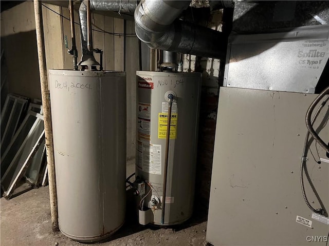 utility room with water heater and heating unit