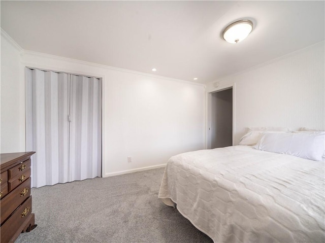 carpeted bedroom featuring baseboards and crown molding