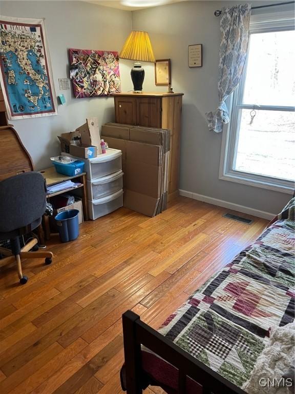 330 Hacadam Rd, Frankfort, NY 13456 - bedroom featuring light wood-type flooring and baseboards