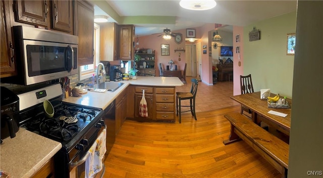 330 Hacadam Rd, Frankfort, NY 13456 - kitchen with appliances with stainless steel finishes, a sink, ceiling fan, and light countertops