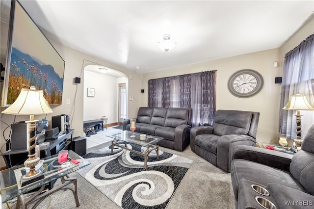 living area with arched walkways