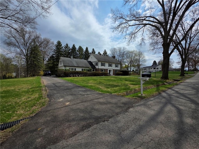 658 Cornell Rd, Elmira-City, NY 14905 - view of front of property featuring a front lawn and aphalt driveway