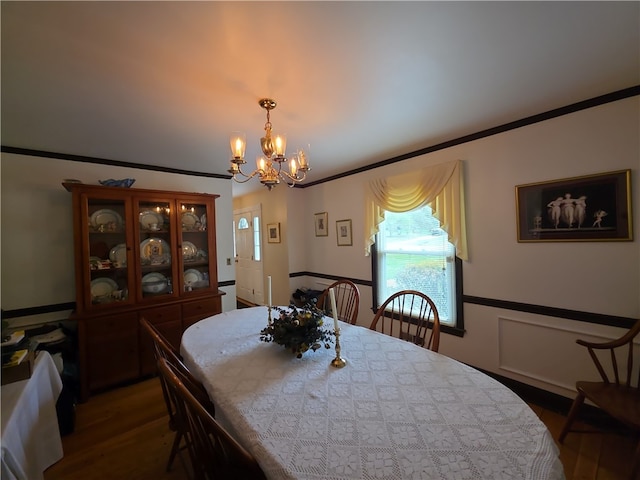 658 Cornell Rd, Elmira-City, NY 14905 - dining room with wood finished floors and an inviting chandelier