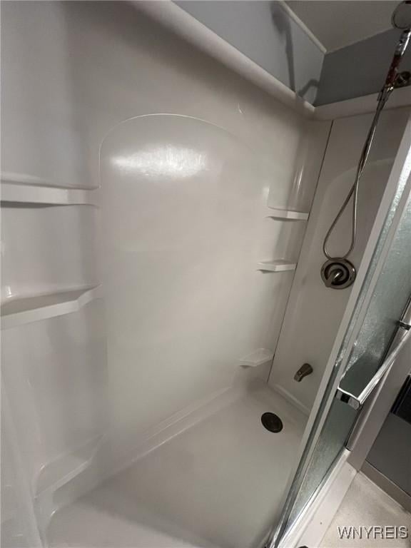 full bathroom with a stall shower