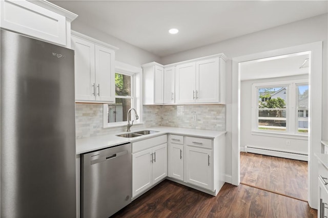 705 W 2nd St, Elmira-City, NY 14905 - kitchen with a baseboard radiator, a sink, appliances with stainless steel finishes, and light countertops