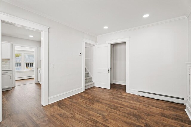 705 W 2nd St, Elmira-City, NY 14905 - unfurnished bedroom with crown molding, a baseboard radiator, dark wood-style floors, and baseboard heating