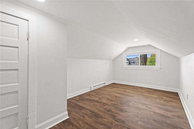 705 W 2nd St, Elmira-City, NY 14905 - additional living space featuring baseboards, vaulted ceiling, wood finished floors, and a baseboard radiator