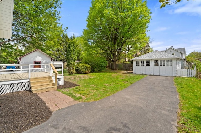 705 W 2nd St, Elmira-City, NY 14905 - view of yard with fence and a wooden deck