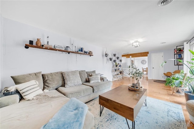 6317 Tonawanda Creek Rd, Lockport-Town, NY 14094 - living room featuring visible vents and light wood-style floors