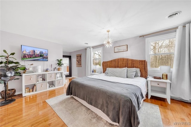 6317 Tonawanda Creek Rd, Lockport-Town, NY 14094 - bedroom with wood finished floors and visible vents