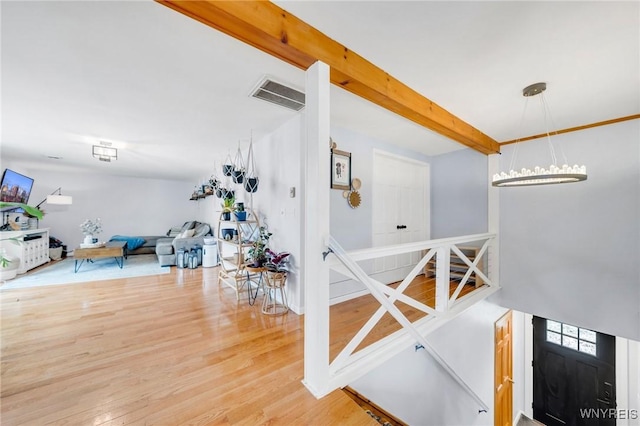 6317 Tonawanda Creek Rd, Lockport-Town, NY 14094 - interior space featuring wood finished floors, visible vents, and beam ceiling
