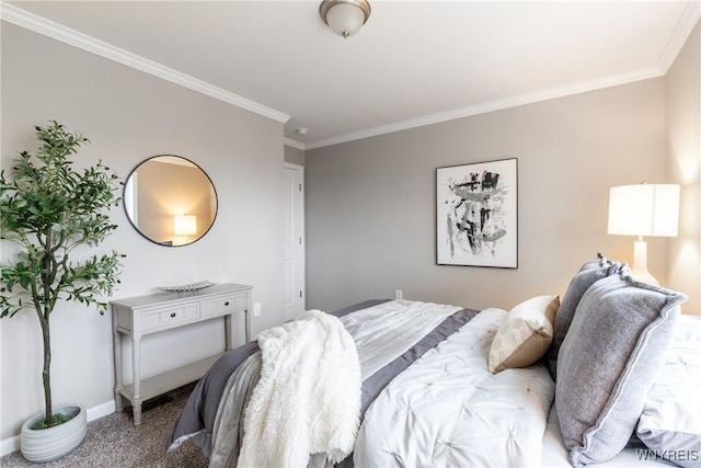 carpeted bedroom with baseboards and ornamental molding