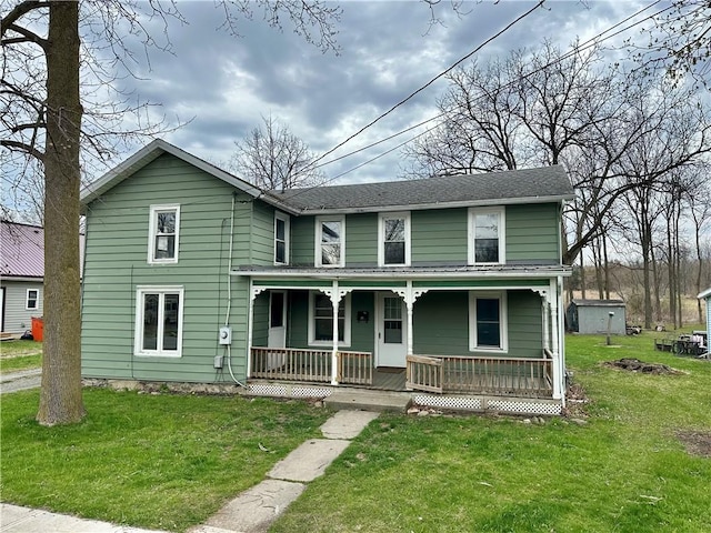 65 Union St, Starkey, NY 14837 - view of front of property with a porch, a front lawn, and roof with shingles