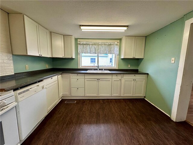 65 Union St, Starkey, NY 14837 - kitchen featuring dark wood-style floors, a sink, a textured ceiling, visible vents, and dishwasher