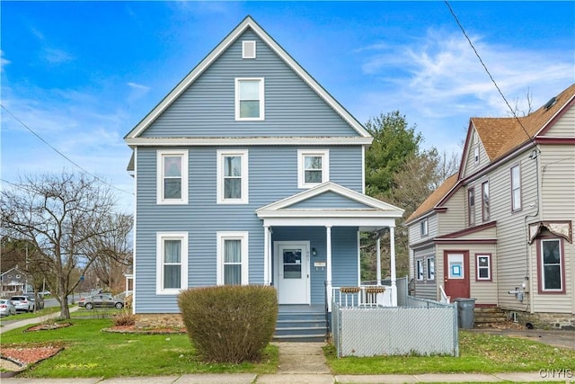 601 W Thomas St, Rome-Inside, NY 13440 - view of front of house with a porch and a front yard