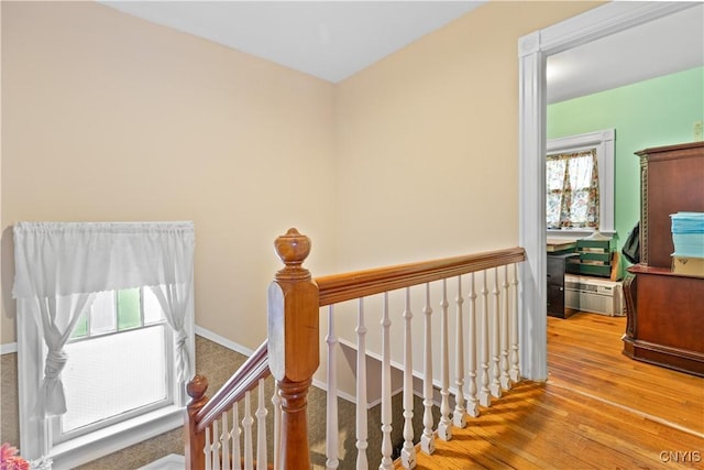 601 W Thomas St, Rome-Inside, NY 13440 - stairs with baseboards and wood finished floors