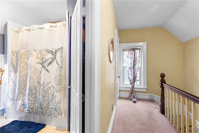 601 W Thomas St, Rome-Inside, NY 13440 - hallway featuring lofted ceiling, baseboards, and an upstairs landing
