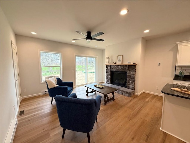 2002 Maes Lndg, Canandaigua-Town, NY 14424 - living area featuring recessed lighting, light wood-style floors, visible vents, and ceiling fan