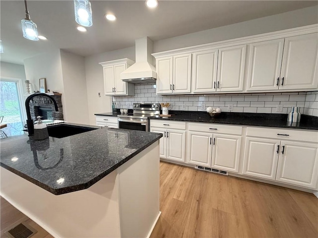 2002 Maes Lndg, Canandaigua-Town, NY 14424 - kitchen with premium range hood, electric range, a sink, and light wood finished floors
