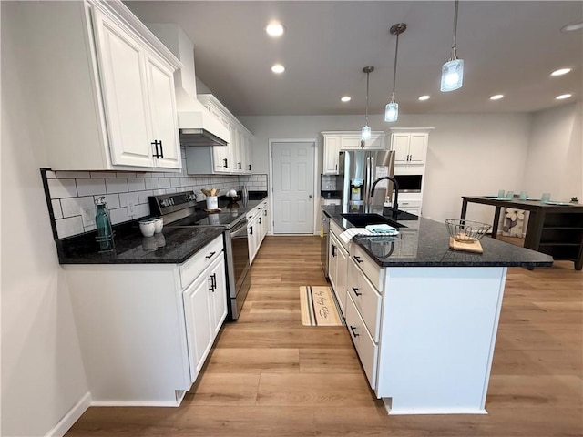 2002 Maes Lndg, Canandaigua-Town, NY 14424 - kitchen with white cabinets, stainless steel appliances, a sink, backsplash, and premium range hood