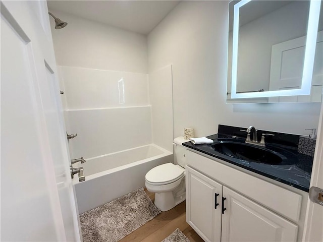 2002 Maes Lndg, Canandaigua-Town, NY 14424 - bathroom featuring toilet, shower / bathtub combination, vanity, and wood finished floors