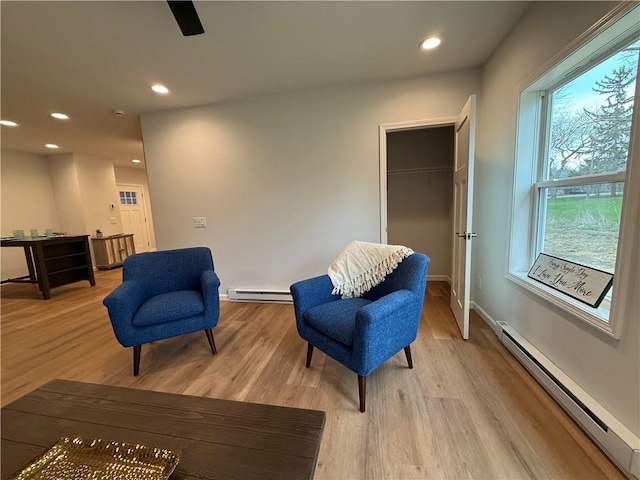 2002 Maes Lndg, Canandaigua-Town, NY 14424 - sitting room featuring a baseboard heating unit, baseboards, light wood finished floors, and recessed lighting