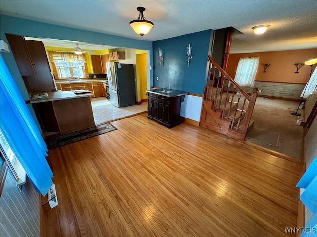 1432 Quaker Rd, Somerset, NY 14012 - kitchen with a sink, freestanding refrigerator, light wood-type flooring, pendant lighting, and open floor plan