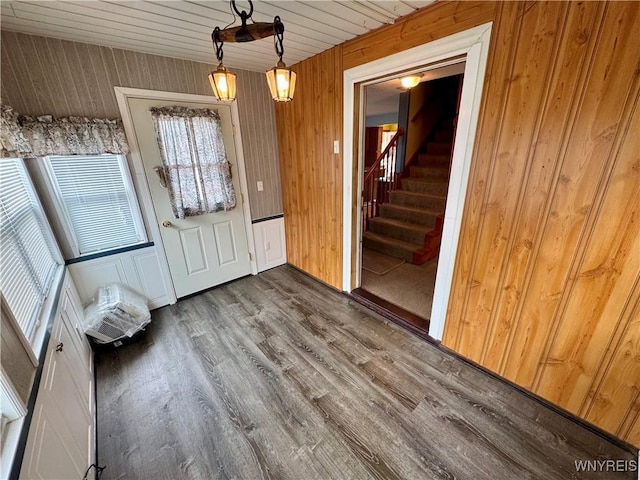 1432 Quaker Rd, Somerset, NY 14012 - interior space featuring wood walls, stairs, dark wood-style flooring, and wooden ceiling