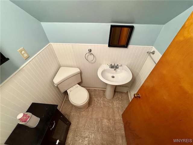 1432 Quaker Rd, Somerset, NY 14012 - half bath with wainscoting, toilet, and tile patterned flooring
