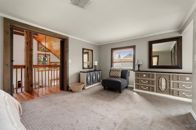 living area with carpet floors and ornamental molding