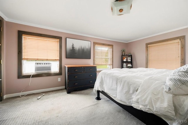 bedroom featuring cooling unit, baseboards, light colored carpet, and ornamental molding