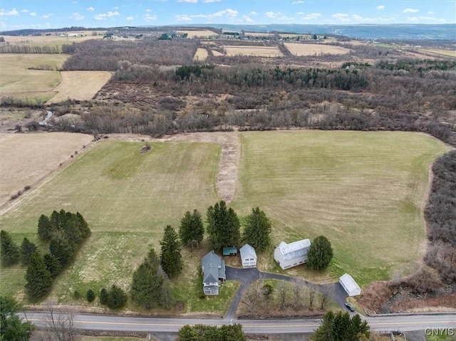 birds eye view of property featuring a rural view