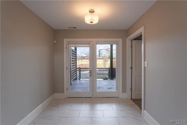 35 Ojibwa Cir, Buffalo, NY 14202 - doorway featuring marble finish floor, baseboards, and visible vents