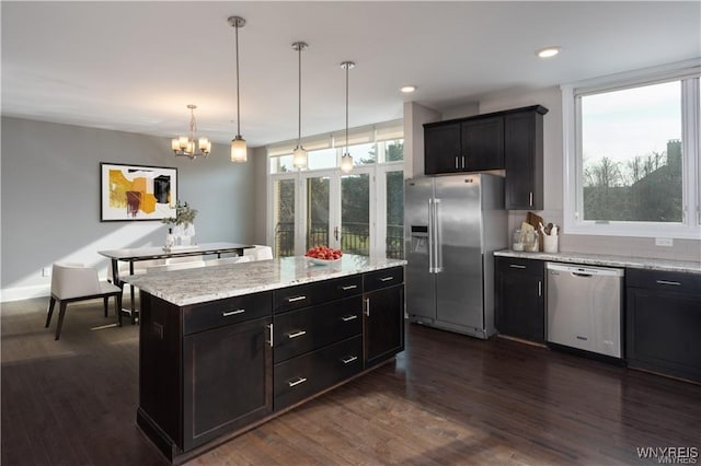 35 Ojibwa Cir, Buffalo, NY 14202 - kitchen featuring backsplash, dark wood-type flooring, pendant lighting, and stainless steel appliances