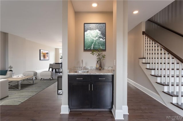35 Ojibwa Cir, Buffalo, NY 14202 - bar featuring wet bar, stairs, dark wood-style flooring, and a sink