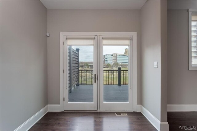 35 Ojibwa Cir, Buffalo, NY 14202 - entryway featuring baseboards, visible vents, and dark wood-style floors