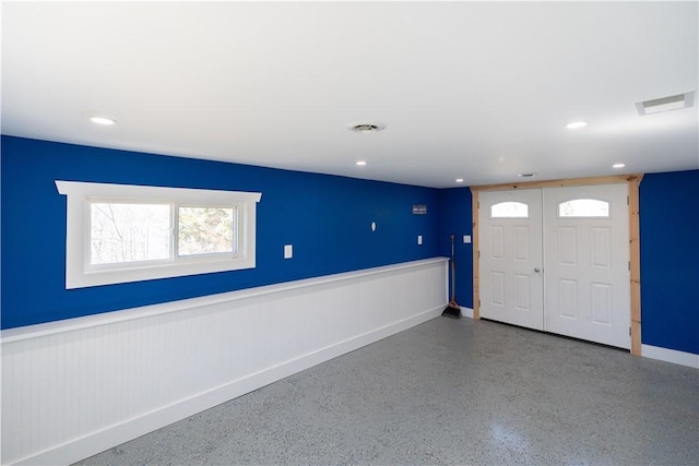 foyer with plenty of natural light, visible vents, and recessed lighting