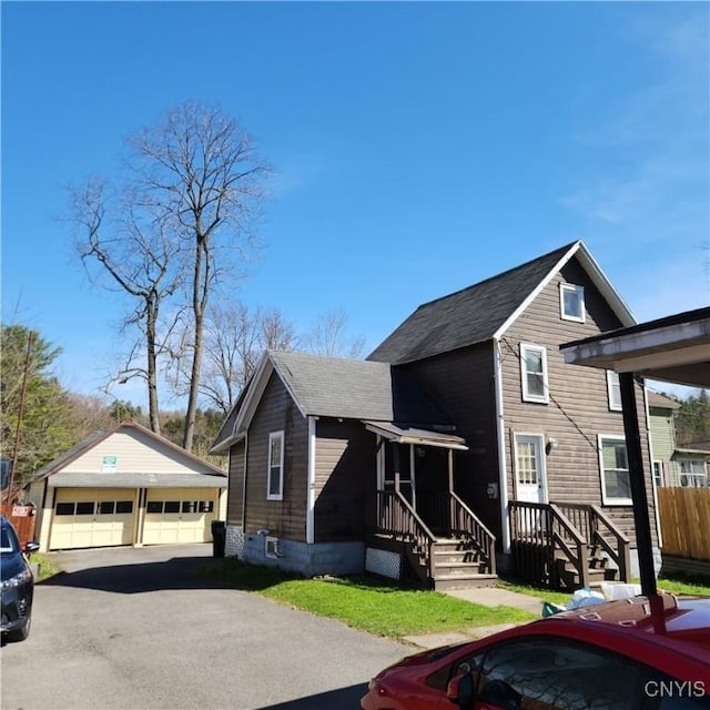 417 Otsego St, German Flatts, NY 13357 - view of front of home featuring an outbuilding and a garage