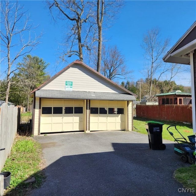 417 Otsego St, German Flatts, NY 13357 - detached garage featuring fence
