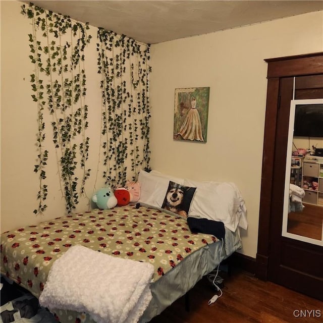 417 Otsego St, German Flatts, NY 13357 - bedroom featuring wood finished floors