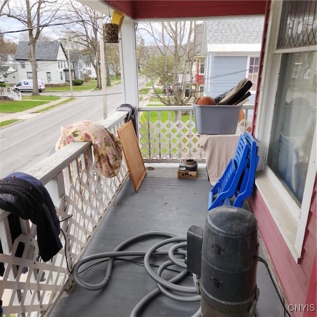 417 Otsego St, German Flatts, NY 13357 - view of patio / terrace with a residential view and a porch