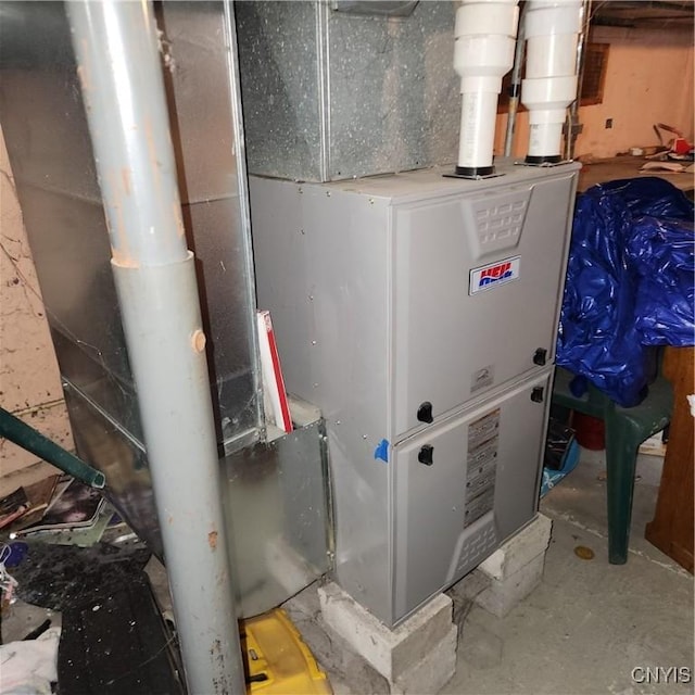 417 Otsego St, German Flatts, NY 13357 - utility room featuring heating unit