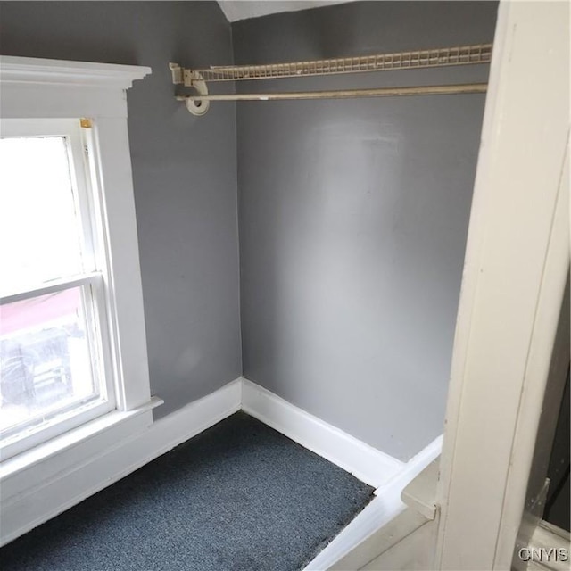 417 Otsego St, German Flatts, NY 13357 - carpeted empty room with baseboards and a healthy amount of sunlight