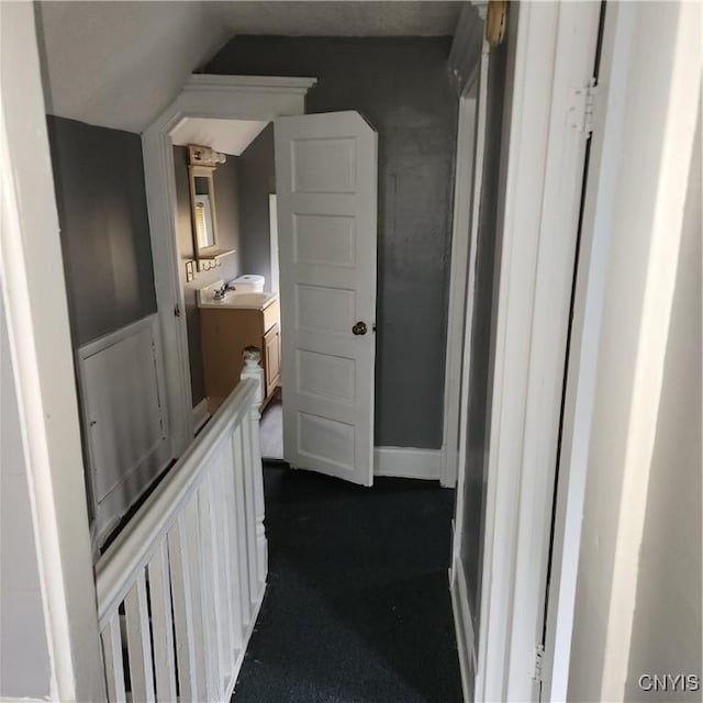 417 Otsego St, German Flatts, NY 13357 - hallway featuring lofted ceiling and a sink