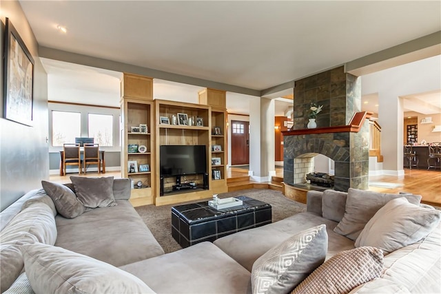 4872 Bedford Dr, Canandaigua-Town, NY 14424 - living room with a tile fireplace and baseboards